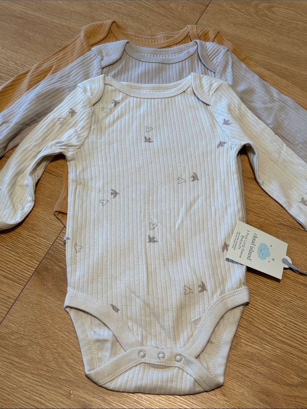 💙 3 FOR $22
Neutral Ribbed Long-Sleeve Baby One-Piece - Set of 3